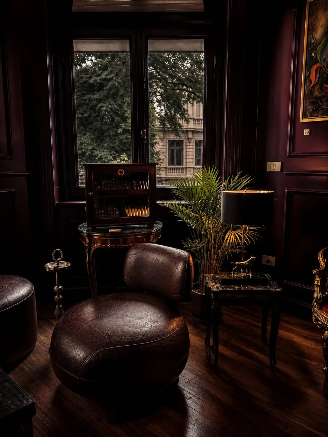 A quiet corner of the lounge with a cigar cabinet and deep leather armchair